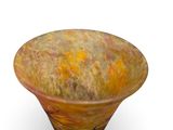 a glass bowl that is sitting on top of a stand