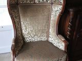 a chair that is sitting in the corner of a room