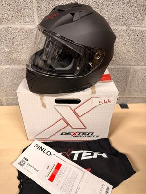 a helmet on top of a box on a table