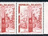 a close up of a stamp with a picture of trees on it