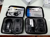four different types of electronics in a case on a table