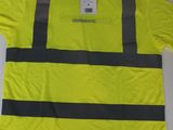 an image of a yellow shirt with reflective stripes on it