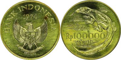 a close up of a gold coin with an eagle on it