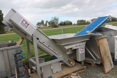 a dumpster that has a solar panel on top of it
