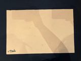a piece of paper that has a picture of a giraffe on it