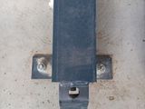 a blue metal object on the floor in the room