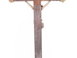 an old wooden cross with a crown on it on a white background
