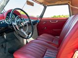 a red leather seat in the back of a car