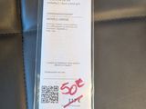 a cell phone that is sitting on the seat of a car