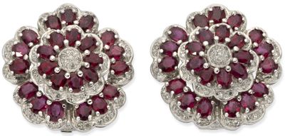 a pair of ruby and diamond earrings