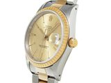 an image of a lady ' s rolex watch with two tone gold dial