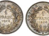 two silver coins, one of which is the same size as the other