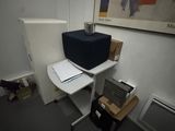a desk with a computer and a printer on it