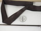 a tie that is tied to a pole on a table