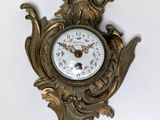 a clock that is hanging on the wall in the room