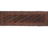 a long, colorful rug with a pattern on it