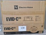 two boxes of electronic devices are stacked on top of each other