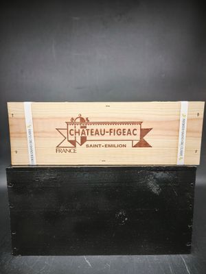 une boîte en bois sur laquelle est collée une étiquette portant l'inscription « château - figecac »