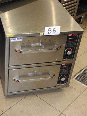 deux fours à pizza superposés dans une cuisine