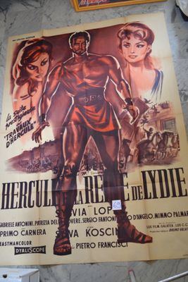 a large poster of a man standing next to a woman