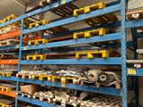 the shelves are full of different types of metal items