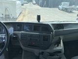 a view of the inside of a vehicle from the driver ' s seat