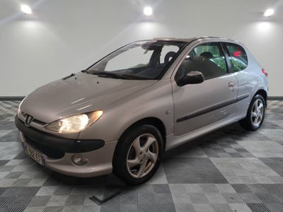 a picture of a silver car parked in a garage