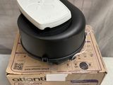 a black and white box with a white lid on it