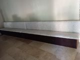a couch that is sitting in the corner of a room