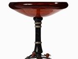 an image of a table with a glass bowl on top of it