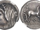 a close up of a coin with a horse on it