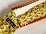 tie in a box on a table with a note in it