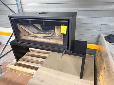 a wood burning stove in the corner of a room