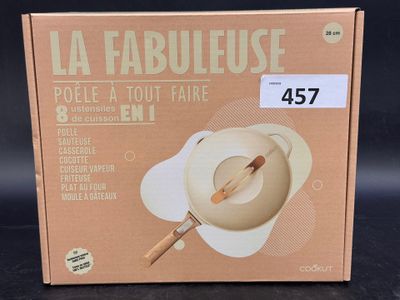 boîte en carton sur laquelle est représenté un bol contenant une cuillère en bois