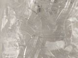 a clear plastic bag with a teddy bear inside of it