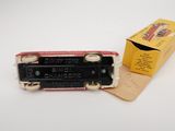 a small toy car that is sitting next to a box