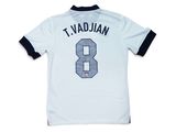 a white t - shirt with the number 8 on it