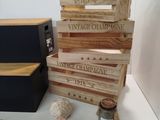 a stack of wooden crates sitting on top of a table