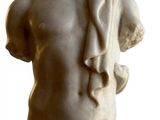 marble statue of a male torso with a scarf draped around his neck