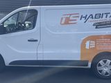 a van that is parked on the side of the road