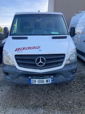 a white van that is parked in a lot