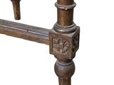 a close up of a wooden table with a glass top
