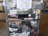 a metal cart with many items in it in a warehouse