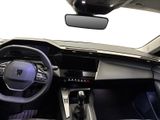 the interior of a car with a steering wheel and dashboard