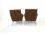 pair of mid century style chairs in brown velvet upholstered with wooden legs