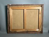 an old picture of a picture frame with a piece of paper taped around it