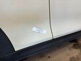 a sticker on the side of a car that has a sticker on it