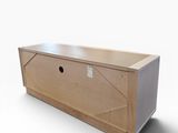 a wooden box with a metal lid on a white surface