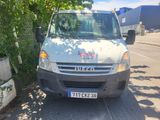 a white van parked on the side of the road