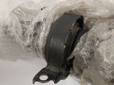 a close up of a piece of plastic wrapped in plastic on top of a box